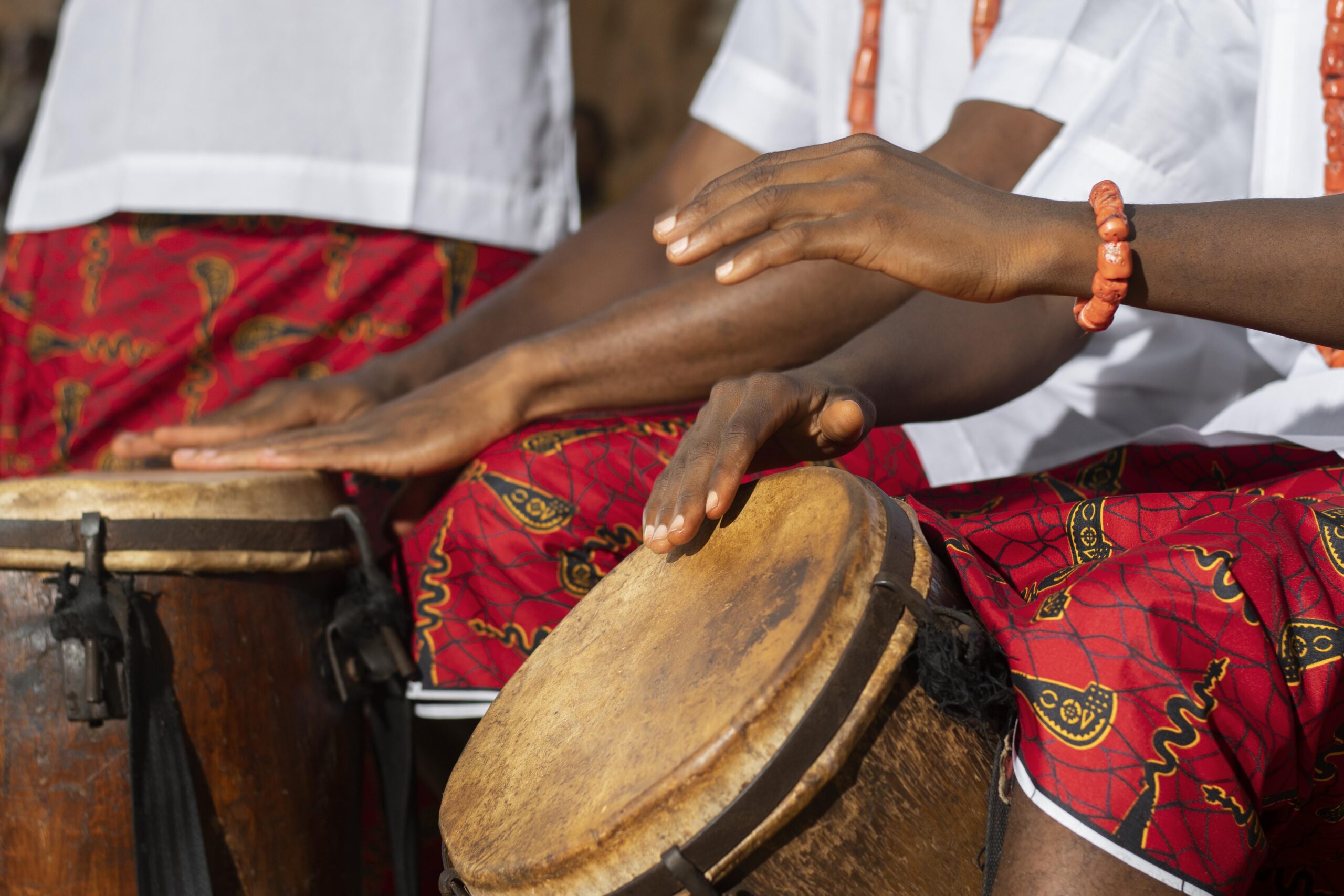 hands-playing-drums-close-up